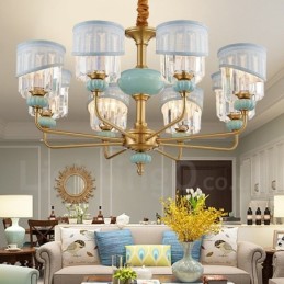 純真鍮の贅沢な素朴なレトロヴィンテージ真鍮セラミックペンダントキャンドルシャンデリア、ファブリックとクリスタルシェード付き