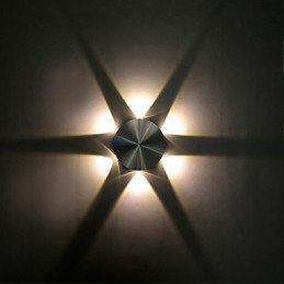 ミニスタイルの電球型壁ライトに統合されたモダンで現代的な絵画機能